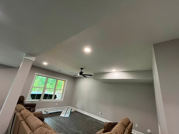 DainCo recessed ceiling lighting and ceiling fan in a living room